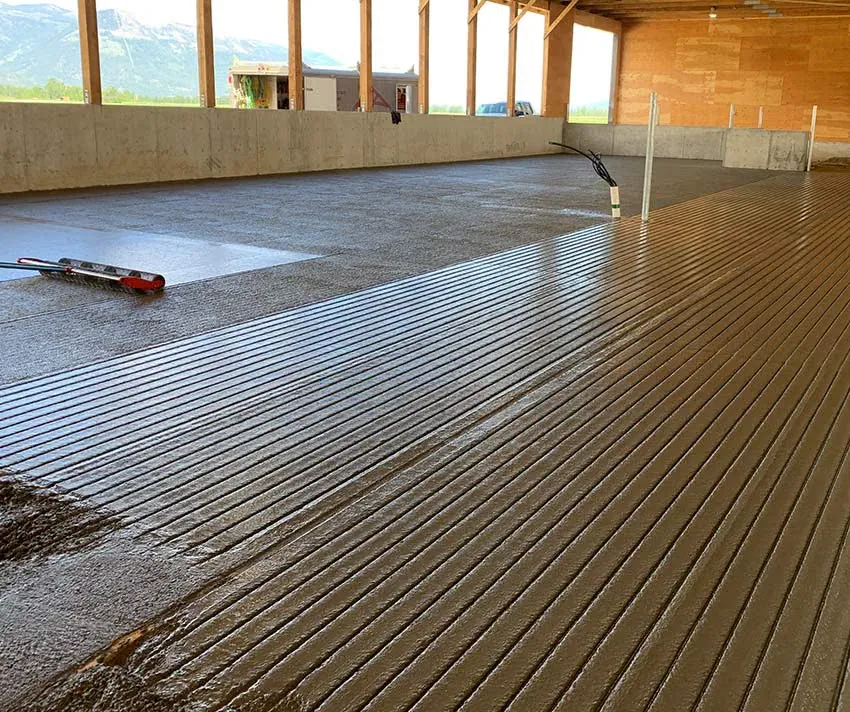 3D Concrete crew placing and finishing an agricultural concrete floor