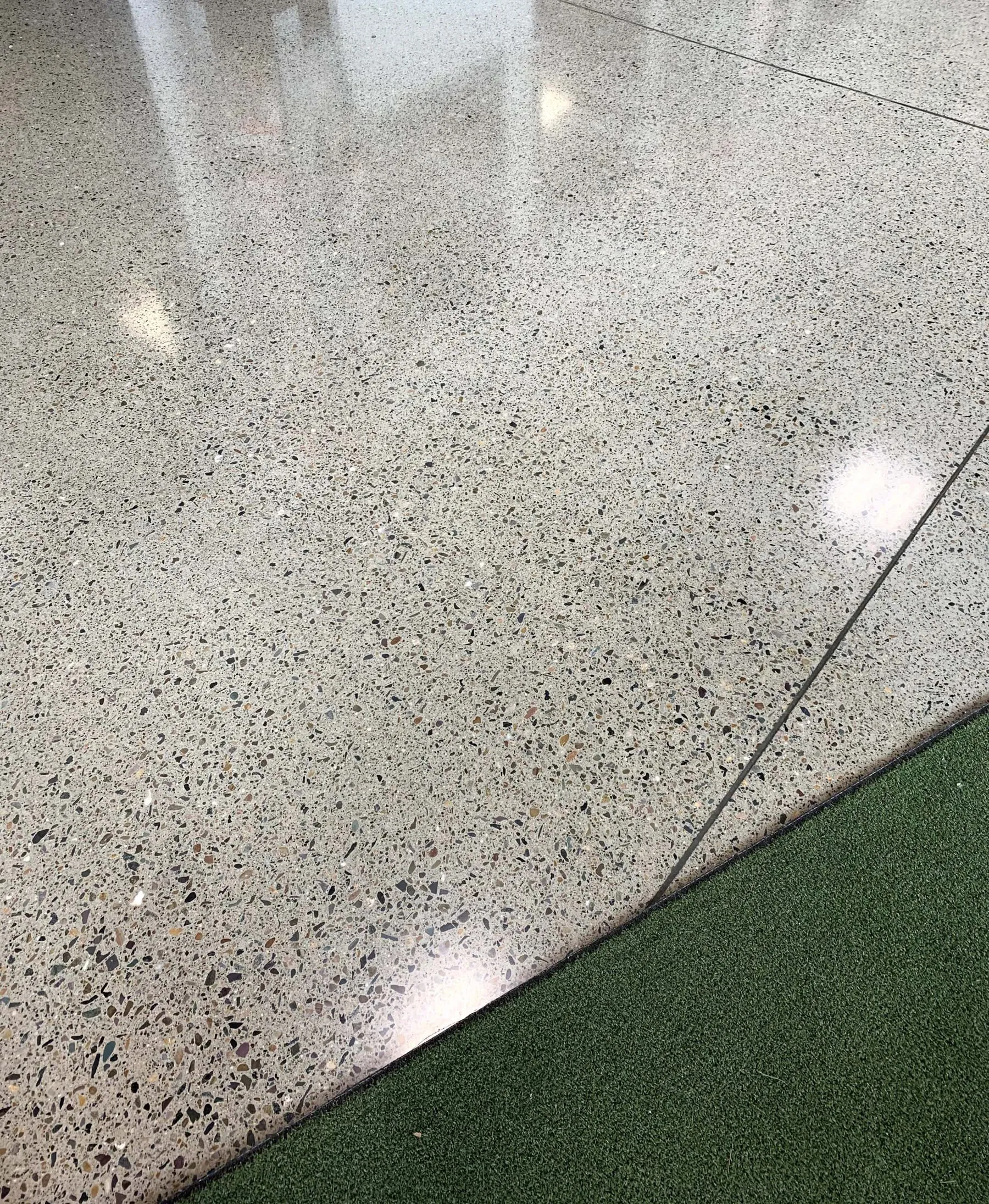 Deep-grind concrete floor preparation with diamond tooling