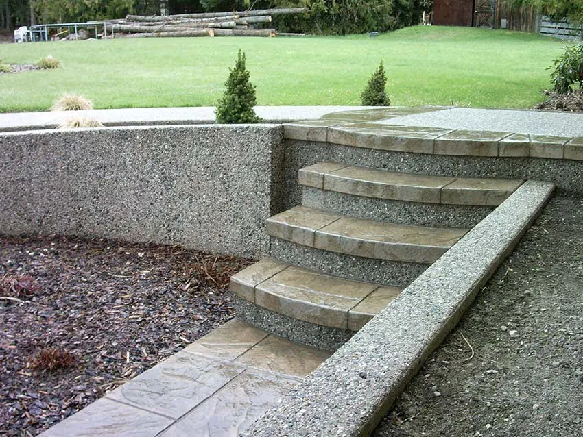 Stamped concrete steps and a flagstone-look walkway built by 3D Concrete near Creston BC
